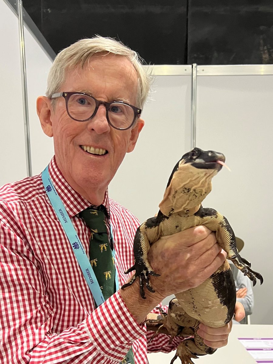 Robert Johnson AM holding a lace monitor